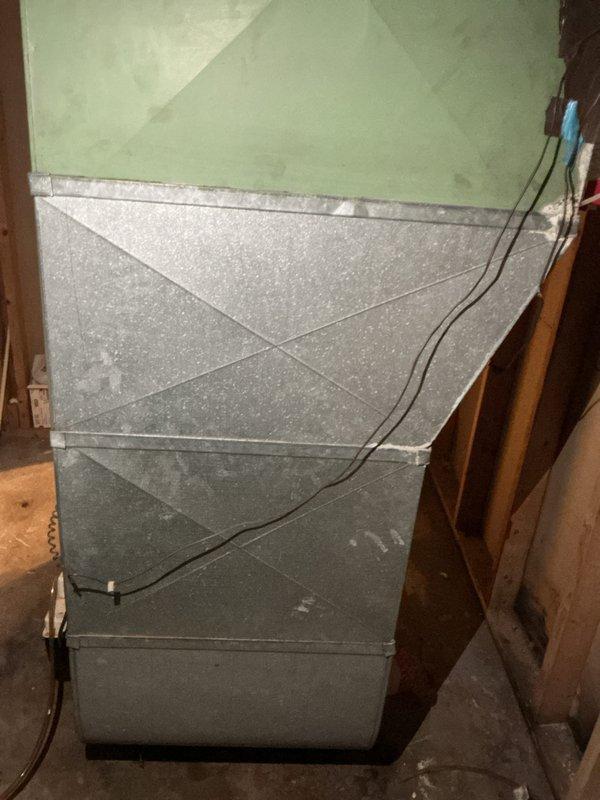 Conducted a full HVAC system estimate for a 1600 sq ft home with an existing forced-air system featuring an older air handler/furnace unit installed in the basement. Evaluated the current digital thermostat and discussed options for both traditional system replacement and mini-split installation for the den/office area as requested by the customer.