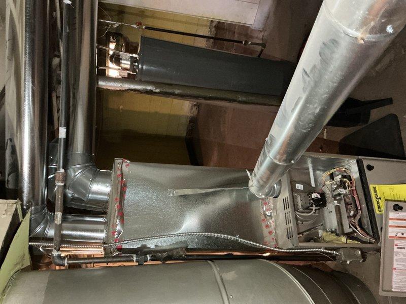 Performed routine tune-up on furnace system less than 10 years old at customer's request to ensure safe operation. Inspected furnace unit, control board, wiring connections, and examined ductwork seals throughout the basement installation. All components functioning properly with no safety issues identified.