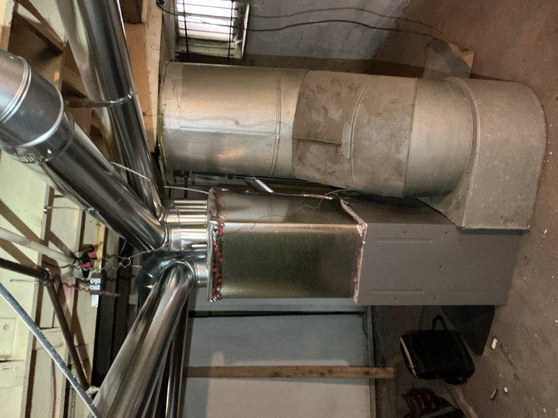 Performed routine tune-up on furnace system less than 10 years old at customer's request to ensure safe operation. Inspected furnace unit, control board, wiring connections, and examined ductwork seals throughout the basement installation. All components functioning properly with no safety issues identified.