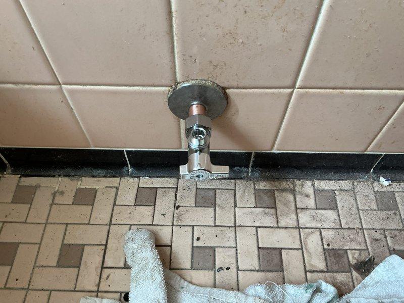 Responded to service call for water leakage from toilet fill valve assembly. Upon inspection, replaced defective fill valve and installed new shut-off valve to address the leak and provide proper water control functionality. All connections were tested for proper operation with no further leaks observed.