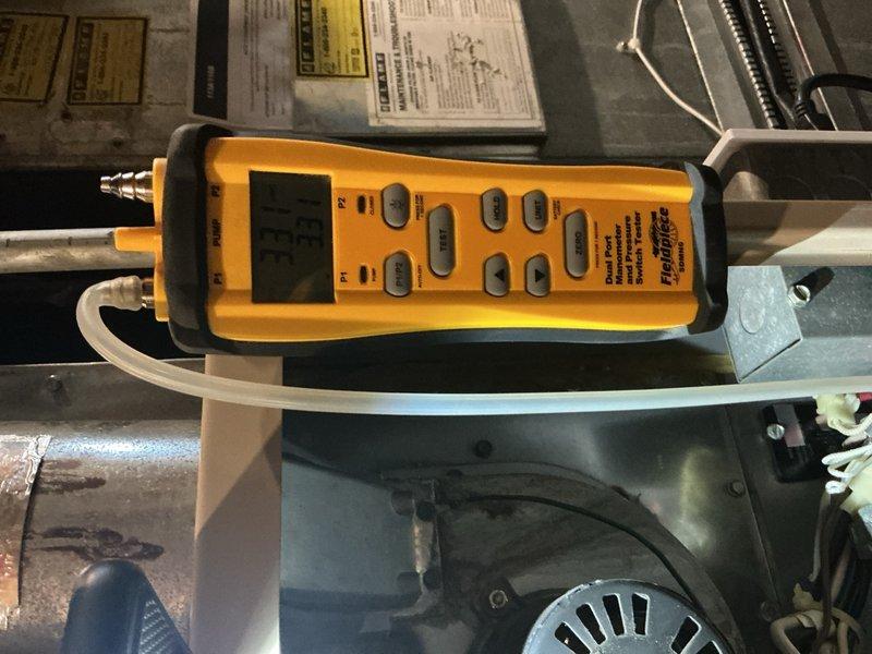 Performed routine tune-up on gas furnace of undetermined age. Conducted combustion analysis using Fieldpiece digital meter to verify proper operation. Inspected burner assembly which displayed appropriate blue flame pattern, indicating efficient combustion and proper gas-air mixture. All components functioning normally with no issues detected.