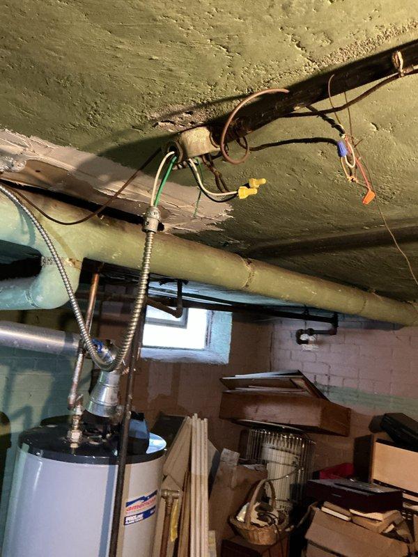 Responded to callback regarding furnace that randomly shuts off and requires manual restart. Inspected boiler system in basement and found fault with the Precision Water Feeder control displaying error code "12", indicating improper water level regulation. Verified wiring connections at junction box, reset control module, and restored proper operation of the 10+ year old system.