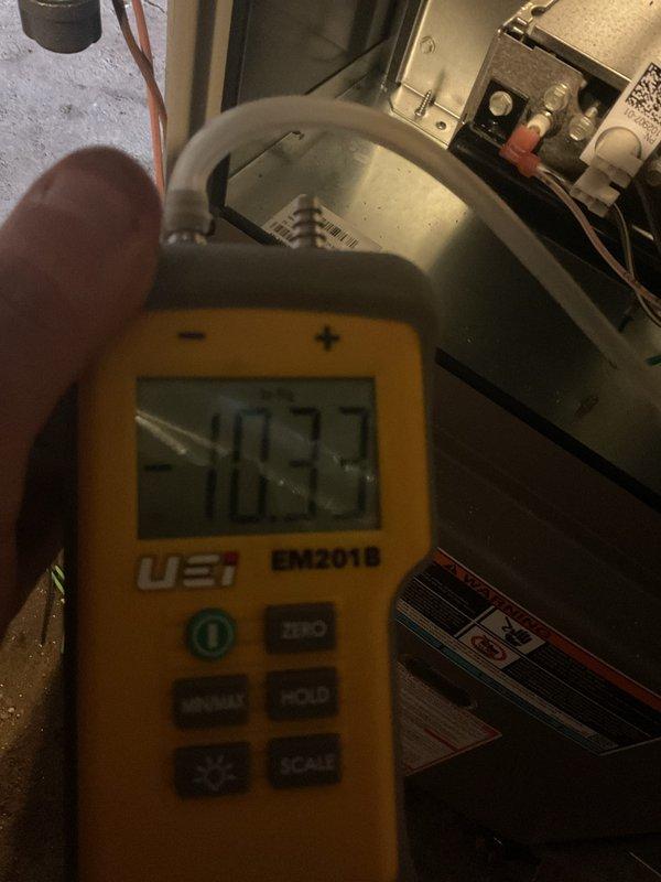 Successfully completed furnace installation with new thermostat, condensate pump, and ductwork modifications including 5x35 and 10x6 register additions. System was properly calibrated and tested with diagnostic equipment showing optimal readings of 10.37 during final inspection, with municipal permit requested for the installation.