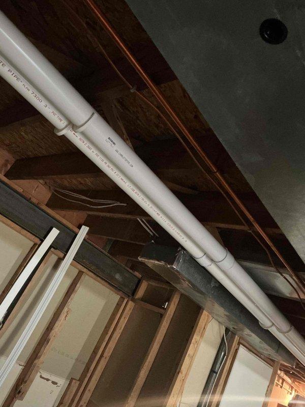 Successfully completed installation of a complete HVAC system including a 110,000 BTU furnace, 3.5-ton AC unit, and Ecobee 3 Lite thermostat. Relocated air conditioning unit to left of window as requested, installed new PVC drainage lines, and properly connected copper refrigerant piping. System includes new 600m humidifier with all proper mechanical permits obtained and utility connections coordinated.