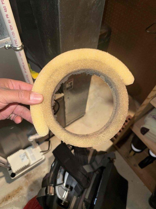 Responded to service call for homeowner requesting modification of vent pipe configuration from curved to 90-degree angle. Inspected 12-year-old furnace system located in basement, evaluated existing flexible ductwork, and assessed foam pipe insulation condition. Performed filter and humidifier component inspection to determine replacement part availability.