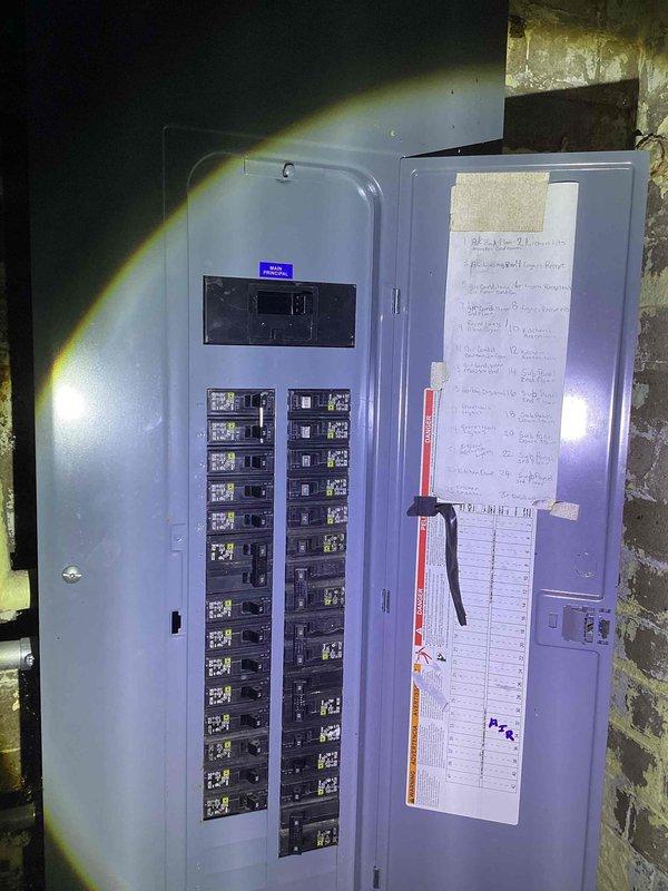 Conducted site inspection for new furnace installation to replace existing 40-year-old unit located in residential basement. Documented electrical panel configuration and current heating infrastructure, noting extensive piping network with visible condensation on white PVC joints. Customer was referred through Google search and quote has been prepared for complete system replacement.