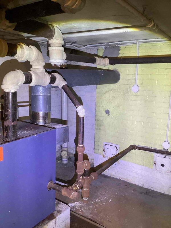 Conducted site inspection for new furnace installation to replace existing 40-year-old unit located in residential basement. Documented electrical panel configuration and current heating infrastructure, noting extensive piping network with visible condensation on white PVC joints. Customer was referred through Google search and quote has been prepared for complete system replacement.