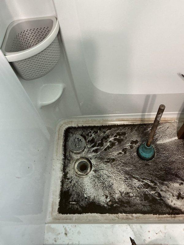 Responded to emergency service call for a main drain backup affecting the toilet and shower. Performed temporary drain cleaning to restore functionality of plumbing fixtures until the scheduled stack repair on Monday. Identified significant buildup and residue in the drain system that will require the more comprehensive stack repair as previously arranged.
