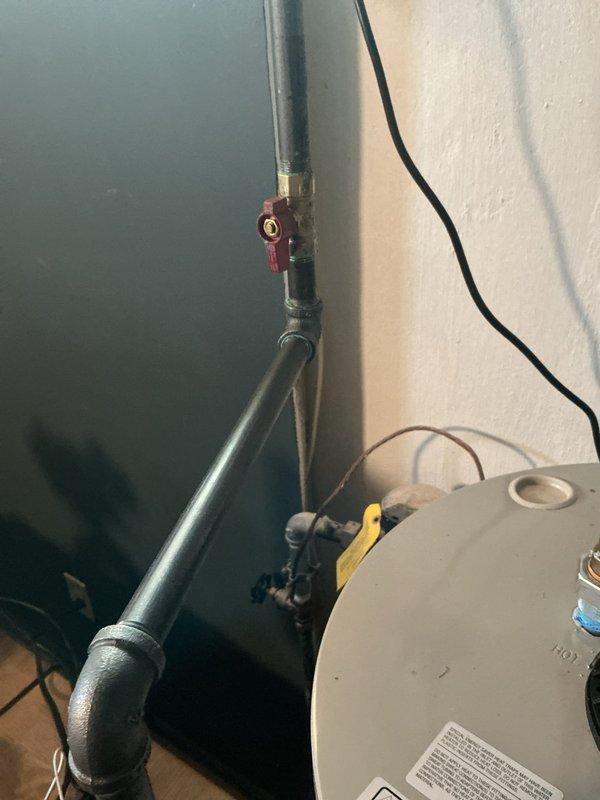 Responded to a callback for gas odor from a newly installed furnace. Upon inspection, found and corrected improper gas line connection at the shutoff valve. Verified proper operation of the furnace, water heater, and associated venting system. All systems now functioning normally with no gas leaks detected.