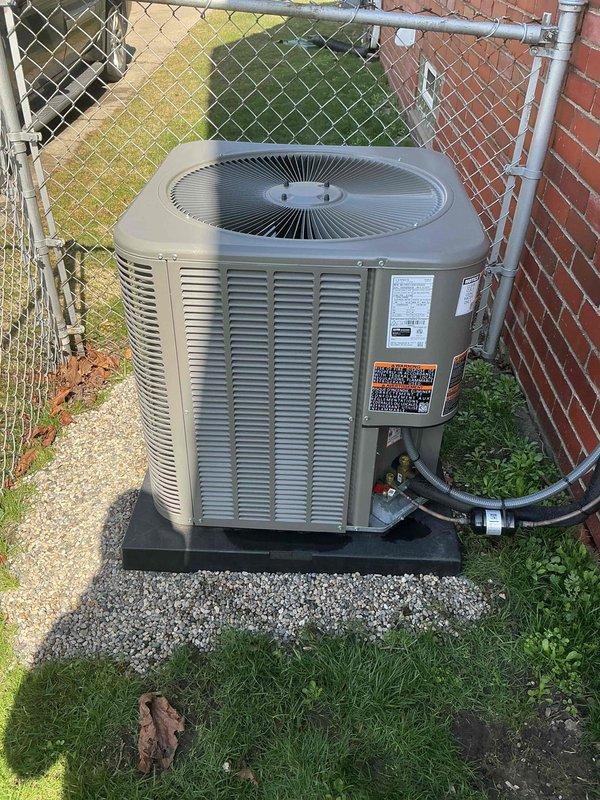 Completed installation and startup of Lennox model ML13KC1-030-230A04 air conditioning system with R-454B refrigerant. Unit was properly mounted on a black pad with gravel base, with all refrigerant lines and electrical connections secured according to manufacturer specifications. System was successfully tested and is operating within normal parameters.