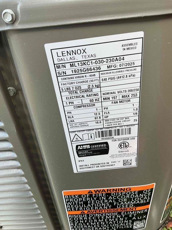 Completed installation and startup of Lennox model ML13KC1-030-230A04 air conditioning system with R-454B refrigerant. Unit was properly mounted on a black pad with gravel base, with all refrigerant lines and electrical connections secured according to manufacturer specifications. System was successfully tested and is operating within normal parameters.