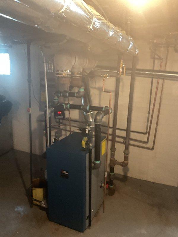 Successfully installed new high-efficiency boiler system with complete copper and PVC piping infrastructure. System includes properly insulated ductwork, all necessary valves and connectors, and was verified operational with all safety mechanisms tested. Michigan Saves financing was secured for this installation with all required documentation submitted.
