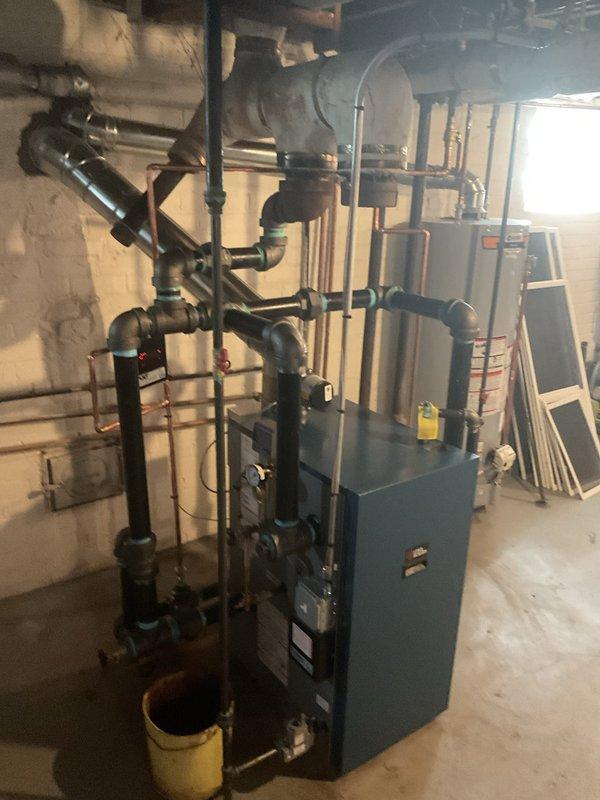 Successfully installed new high-efficiency boiler system with complete copper and PVC piping infrastructure. System includes properly insulated ductwork, all necessary valves and connectors, and was verified operational with all safety mechanisms tested. Michigan Saves financing was secured for this installation with all required documentation submitted.