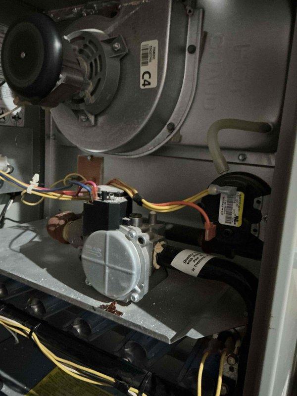 Performed Gold Furnace Inspection on 2006 American Standard furnace located in basement. Inspected blower motor, gas valve, and electrical connections, finding all components in normal working condition with no visible damage, excessive corrosion, or mechanical anomalies. System is operating properly with proper airflow and no immediate service concerns identified.