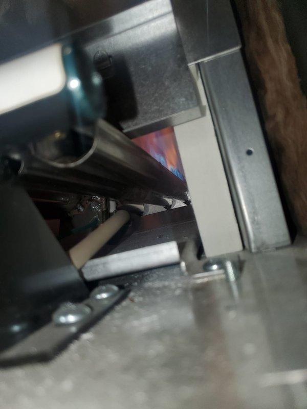 Responded to callback for newly installed boiler system struggling to maintain temperature above 69°F. Inspected burner assembly and flame pattern, finding proper ignition but inadequate heat transfer. Adjusted control parameters and verified proper function of expansion tank and copper supply lines, resulting in improved heating performance to meet customer's comfort requirements.