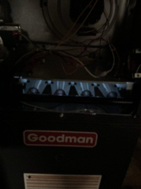Responded to service call for non-operational Goodman electric furnace (approximately 2 years old). Diagnostic inspection revealed severely clogged air filter causing system restriction and shutdown. Replaced filter and restored proper airflow, returning furnace to normal operation.