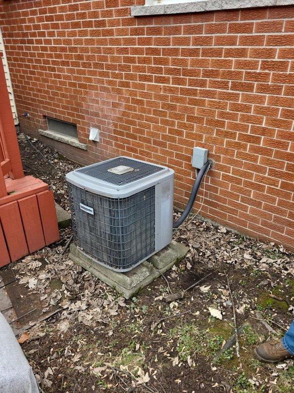 Conducted a comprehensive evaluation of the existing HVAC system, including an aging furnace unit with visible dust accumulation and an outdoor condensing unit mounted on a concrete pad. Assessment focused on full system replacement options with particular attention to the customer's primary concern of replacing the air conditioning component, while also providing alternative scenarios that include furnace replacement for a complete system upgrade.