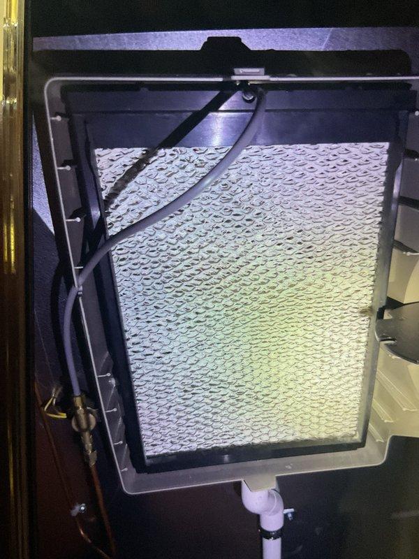 # HVAC Service Report

Performed comprehensive furnace tune-up service on gas-fired heating unit located in basement. Conducted thorough system inspection, cleaning, and maintenance procedures to ensure optimal performance and safety for the upcoming heating season.

## Work Performed

Accessed furnace cabinet and inspected all internal components for wear, damage, and proper operation. Removed and cleaned blower assembly, removing accumulated dust and debris from blower wheel and housing. Inspected heat exchanger for cracks, corrosion, or signs of failure using visual inspection methods.

Examined and serviced air filtration system. Documented existing filter condition, which showed significant dust accumulation and discoloration across mesh surface, indicating extended use period. Inspected filter housing assembly, including hinged access door, frame mounting, and sealing surfaces to ensure proper fit and air bypass prevention.

Cleaned burner assembly and inspected burner flames for