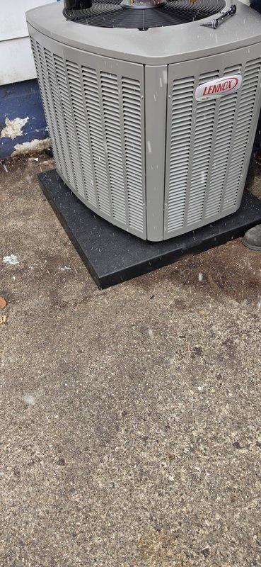 # HVAC Install - A/C & Coil Completion Summary

Successfully installed a complete 1.5-ton air conditioning system including a new Lennox condensing unit and matching evaporator coil. The outdoor condenser was positioned on a composite pad over concrete surface with proper clearances, while the indoor coil was integrated with the existing air handler in the basement utility area. All refrigerant lines, condensate drainage via PVC piping, and electrical disconnects were properly installed per manufacturer specifications, though a licensed electrician is required to complete the new dedicated circuit as noted in the permit requirements.