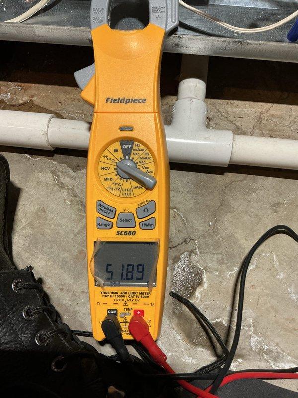 # HVAC Maintenance - Prepaid Visit Summary

Completed comprehensive furnace inspection on 1-year-old residential heating system located in basement. Verified unit operational status and conducted thorough evaluation of all system components including furnace, air handler, and associated ductwork. Inspected system for reported leakage concerns, examining condensate drainage system, PVC piping connections, and trap assembly. Performed electrical diagnostics using clamp meter to verify proper amperage draw and system performance. Documented equipment configuration including Aprilaire accessory component and metallic ductwork with flex connections. All safety labels and manufacturer specifications verified present and legible. System found operational with inspection findings documented photographically for service records.