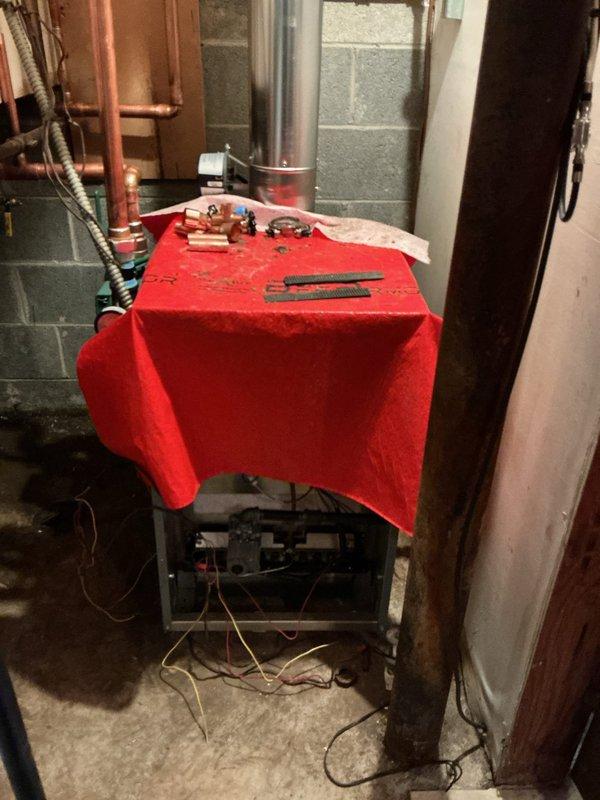 # HVAC Install - Boiler

## Job Summary
Completed residential boiler installation with three-zone heating system configuration, including setup of three thermostats and three zone valves for independent temperature control throughout the home.

## Work Performed
Installed new boiler unit in basement mechanical room per manufacturer specifications and local building codes. Configured three-zone hydronic heating system with dedicated zone valves for each heating area, providing individual climate control capabilities. Installed and wired three thermostats to corresponding zones, ensuring proper communication between controls and zone valves. Connected all copper supply and return piping to boiler manifolds with proper isolation valves for future serviceability. Completed all electrical connections including power supply and low-voltage control wiring to thermostats and zone valves. Installed expansion tank and pressure relief valve assembly to protect system from over-pressurization. Tes