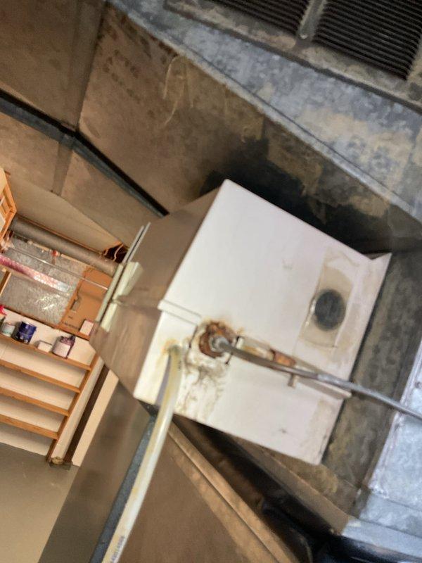 # Service Report

Completed city rental certification inspection on 20-year-old furnace system located in basement. Performed comprehensive tune-up inspection including furnace operational checks, thermostat calibration verification, humidifier assessment, and hot water tank inspection per certification requirements. Documented Kenmore Power Miser 9 water heater condition with visible copper supply lines, brass drain valve, and proper venting configuration. Inspected HVAC unit showing normal wear patterns consistent with age, verified all safety controls operational, and confirmed system meets municipal code requirements for rental property certification. Tagged unit as required for city compliance documentation.