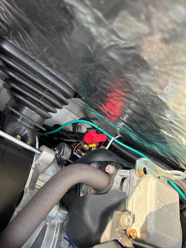 Completed routine electrical maintenance on a Generac 24KW standby generator, confirming all systems operating properly. Performed comprehensive inspection of engine compartment components including air filter assembly, intake manifold, fuel lines, electrical connections, and associated hardware. Customer renewed annual maintenance membership during this service visit.