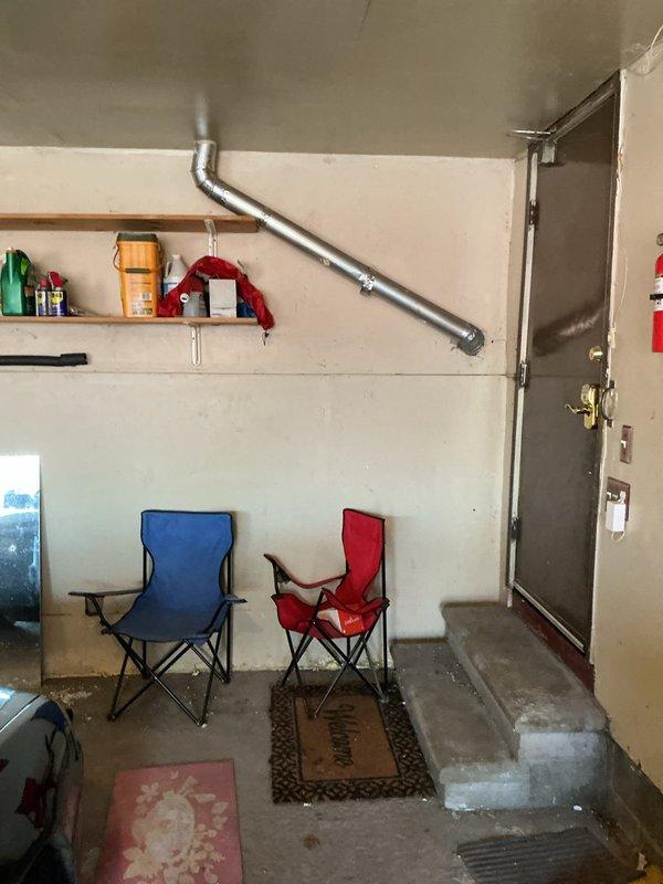 Conducted inspection of existing half-bath exhaust fan system in 1971-built home to assess feasibility of proper ductwork installation to dedicated exterior roof cap for moisture prevention. Examined current fan location in family room and accessed ceiling cavity to evaluate routing options and structural considerations. Documented existing conditions including current duct configuration and identified optimal path for dedicated exterior venting to eliminate moisture damage concerns.