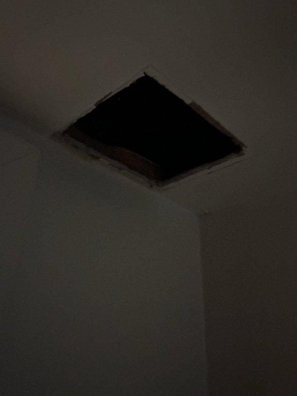 Conducted inspection of existing half-bath exhaust fan system in 1971-built home to assess feasibility of proper ductwork installation to dedicated exterior roof cap for moisture prevention. Examined current fan location in family room and accessed ceiling cavity to evaluate routing options and structural considerations. Documented existing conditions including current duct configuration and identified optimal path for dedicated exterior venting to eliminate moisture damage concerns.