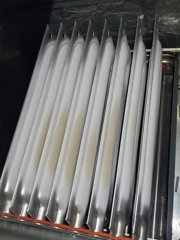 Responded to callback for furnace running but producing no heat in basement location. Performed diagnostic inspection of heating system and heat exchanger assembly, which showed clean condition with no visible damage or obstruction to airflow. Verified thermostat operation showing 72°F set point with heat mode engaged. System requires senior technician follow-up to complete troubleshooting and identify root cause of no-heat condition.