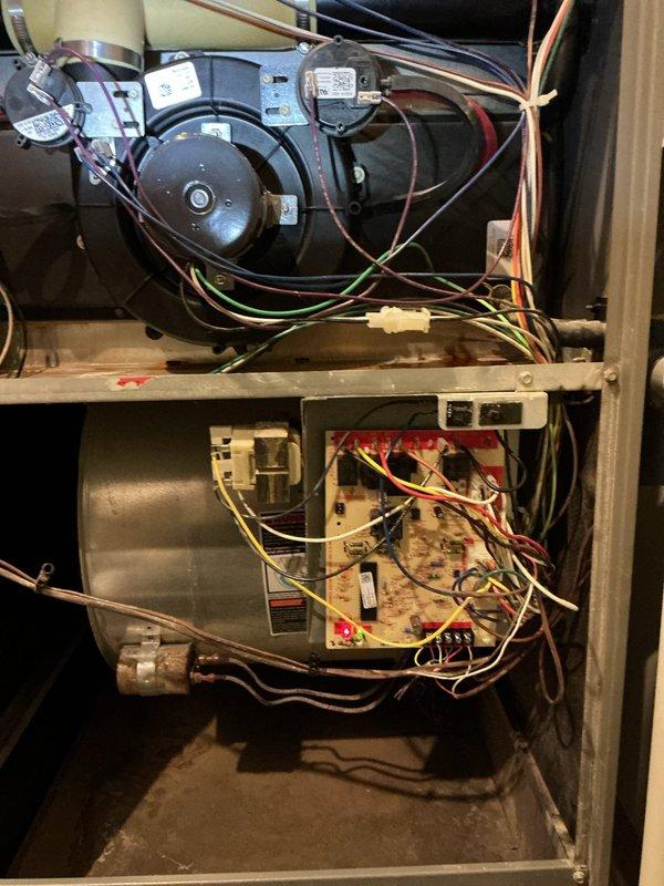 Responded to callback for furnace blowing cold air. Upon inspection of unit located in electrical room, verified all internal components including blower motor assembly, control board wiring connections, gas valve, and burner assembly. Documented system configuration with photos showing proper component installation and electrical connections. All mechanical and electrical systems found operating within normal parameters with no deficiencies related to original service call identified.