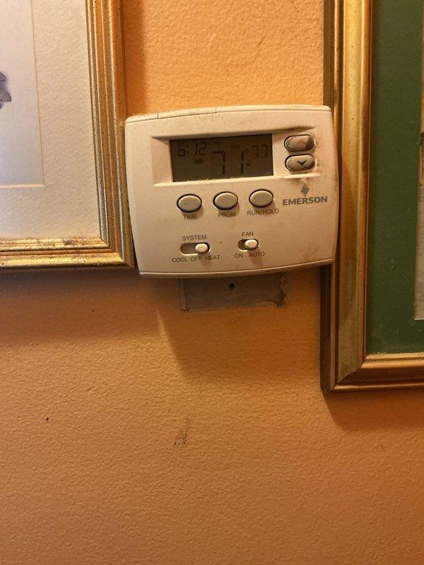 Responded to no-heat call where furnace was not operating. Upon arrival, inspected Emerson programmable thermostat and verified proper settings and power. Proceeded to basement mechanical room and examined heating system. Diagnosed issue with pilot light assembly preventing ignition sequence. Restored system to proper operation and verified heating cycle completed successfully.