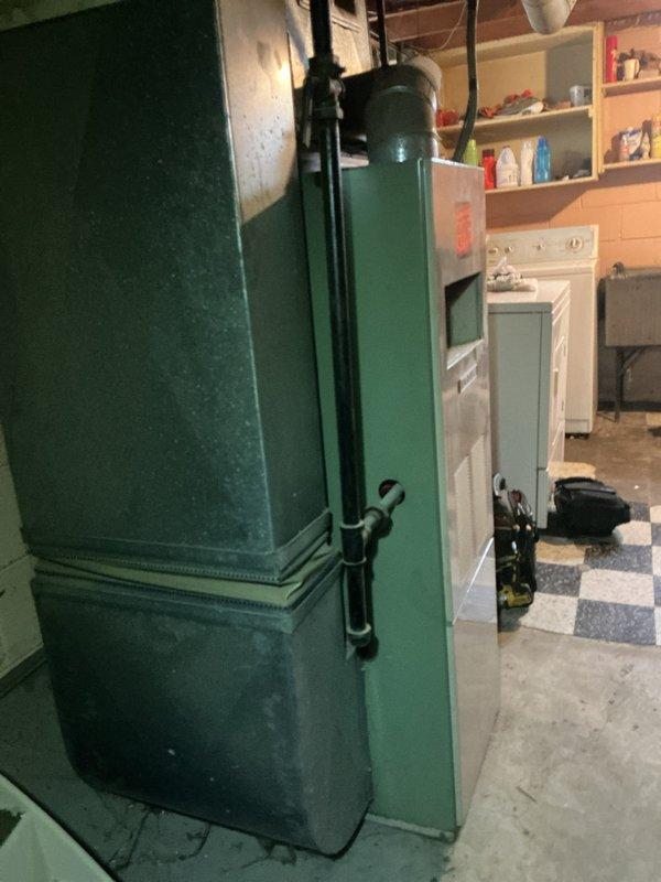 Responded to no-heat call where furnace was not operating. Upon arrival, inspected Emerson programmable thermostat and verified proper settings and power. Proceeded to basement mechanical room and examined heating system. Diagnosed issue with pilot light assembly preventing ignition sequence. Restored system to proper operation and verified heating cycle completed successfully.