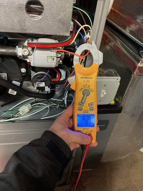 Responded to service call for 2-year-old furnace in basement experiencing intermittent shutdowns and displaying 5-blink error code. Upon arrival, furnace was operational. Performed comprehensive diagnostic testing using digital multimeter to check electrical components, including voltage readings at control board, safety circuits, and flame sensor connections. Tested pressure switches and verified proper operation of ignition system. Measured system pressures at 350 PSI to confirm adequate gas supply and proper combustion. Inspected all wire connections at control board and contactor, verifying secure terminations of red, black, white, and green conductors. Checked condensate drainage system and P-trap configuration for blockages that could trigger safety shutoff. The 5-blink error code typically indicates pressure switch or venting issues; verified all PVC vent pipes were clear and properly configured. System tested through multiple heating cycles with no faults detected. All electric