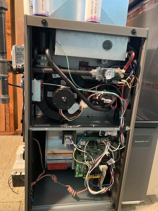 Completed installation of 70,000 BTU furnace system including new thermostat and pump with electrical reconnection to existing panel. Mechanical, electrical, and furnace permits were requested and processed for the installation. System was fully commissioned and qualified for utility rebate program upon completion.