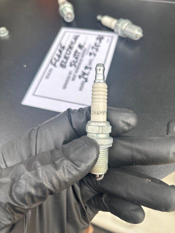 Performed scheduled maintenance on an 18kW Generac standby generator. Replaced spark plugs and installed genuine Generac oil filter (part #070185E). All components were inspected and confirmed to be in proper working condition upon completion.