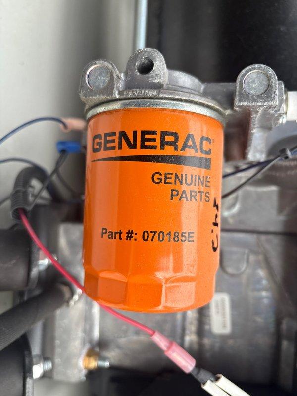 Performed scheduled maintenance on an 18kW Generac standby generator. Replaced spark plugs and installed genuine Generac oil filter (part #070185E). All components were inspected and confirmed to be in proper working condition upon completion.
