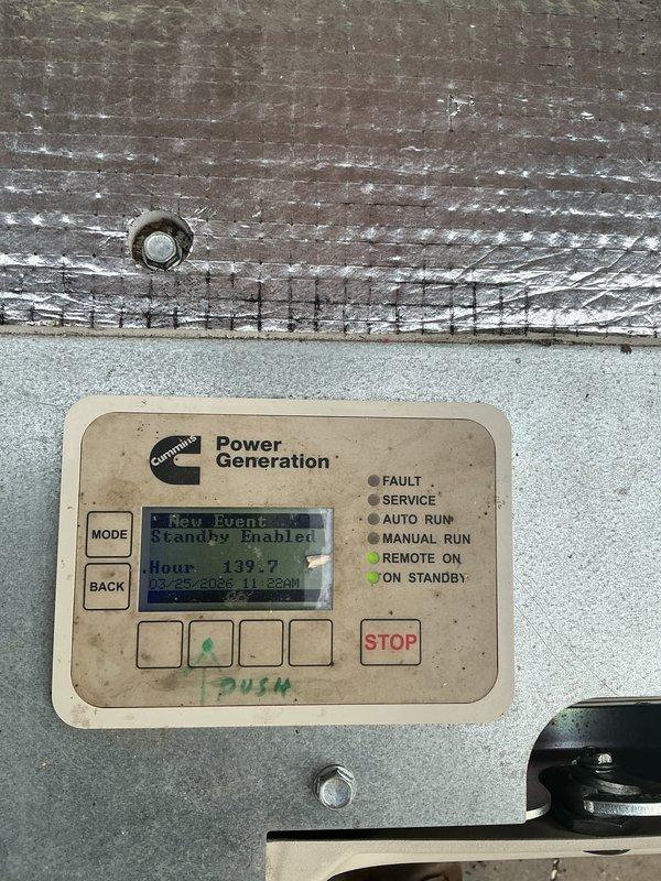 Responded to service call for Cummins residential standby generator not performing scheduled monthly exercise tests. Upon arrival, inspected unit installed in 2020 and accessed control panel to diagnose operational status. Control display showed system in standby mode with 139.7 hours of runtime and last recorded event dated February 2020, indicating exercise cycle had not updated in extended period. Verified AUTO RUN and ON STANDBY indicators were illuminated, confirming unit was armed but not executing programmed test sequences. Reviewed generator control settings and programming parameters to identify cause of missed exercise cycles. Performed system diagnostics to verify battery voltage, control board functionality, and exercise timer configuration. Reset exercise schedule programming and verified proper communication between control module and engine management system. Conducted manual test run to confirm generator starts, runs smoothly, and transfers power correctly. Unit operate