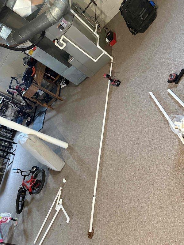 Completed comprehensive tune-up and city inspection preparation on 8-10 year old gas furnace located in basement. Performed full system evaluation including burner assembly operation verification, heat exchanger inspection, blower motor assessment, electrical connection testing, and ductwork examination. All components found operating within normal parameters with burner flames showing proper blue combustion pattern and system controls functioning correctly.