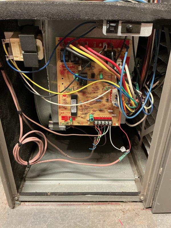 Installed Aprilaire small by-pass humidifier model 313 on existing HVAC system. Connected humidifier to ductwork with proper supply and return air routing, installed humidistat control wiring to furnace control board, and plumbed water supply line with saddle valve connection. Verified all electrical connections at control board, tested humidifier operation, and confirmed proper system integration with heating equipment.