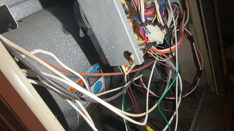 Completed comprehensive tune-up service on furnace unit located in basement, equipment age over 10 years. Performed thorough inspection of blower motor assembly, verified all electrical connections and terminal blocks, checked wiring integrity across control circuits, and examined refrigerant line connections. All components found operating within normal parameters, system tested and confirmed functioning properly at time of service completion.