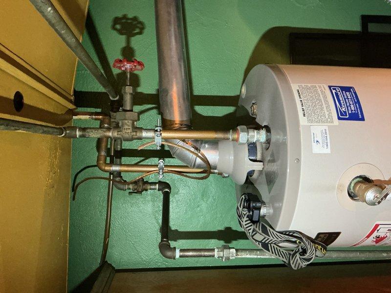 Completed comprehensive tune-up service on furnace unit located in basement, equipment age over 10 years. Performed thorough inspection of blower motor assembly, verified all electrical connections and terminal blocks, checked wiring integrity across control circuits, and examined refrigerant line connections. All components found operating within normal parameters, system tested and confirmed functioning properly at time of service completion.