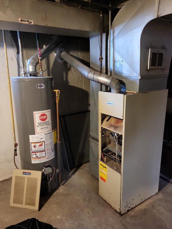 Provided estimate for new air conditioning system installation in basement location. Assessed existing mechanical room configuration with current furnace and water heater setup to determine proper placement and ductwork requirements for AC unit addition. Documented equipment layout and available space for new installation.