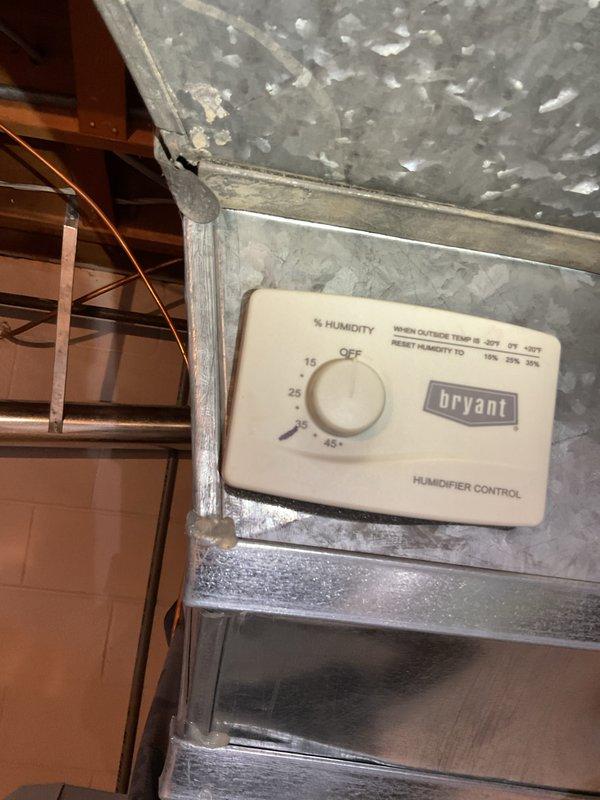 Completed comprehensive Gold Furnace Inspection on a 13-year-old Bryant forced air heating system located in the basement. Performed full system evaluation including visual inspection of furnace cabinet, ductwork, and humidifier control components. All equipment found to be in operational condition with humidifier control panel functioning properly and ductwork showing no signs of deterioration or damage. Documentation photos captured for service records.