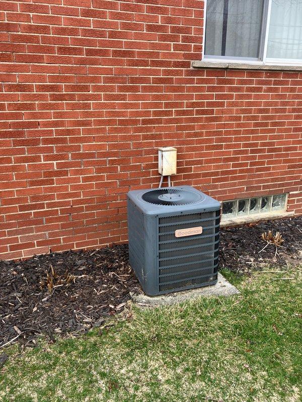 Conducted comprehensive assessment of 20-year-old residential HVAC system for full replacement estimate. Evaluated exterior air conditioning condenser unit mounted on concrete pad with electrical disconnect, noting age-related wear and operational status. Inspected basement furnace/air handler with galvanized steel cabinet, associated ductwork, humidifier components, and copper refrigerant lines to determine complete system replacement specifications and provide detailed quote for new equipment installation.
