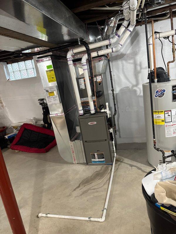 Completed installation of 2.5 ton A/C system with evaporator coil, including rear discharge configuration and line set reconnection. Mechanical, electrical, and air conditioning permits were requested and installation was performed per manufacturer specifications, with all equipment properly labeled and documented.