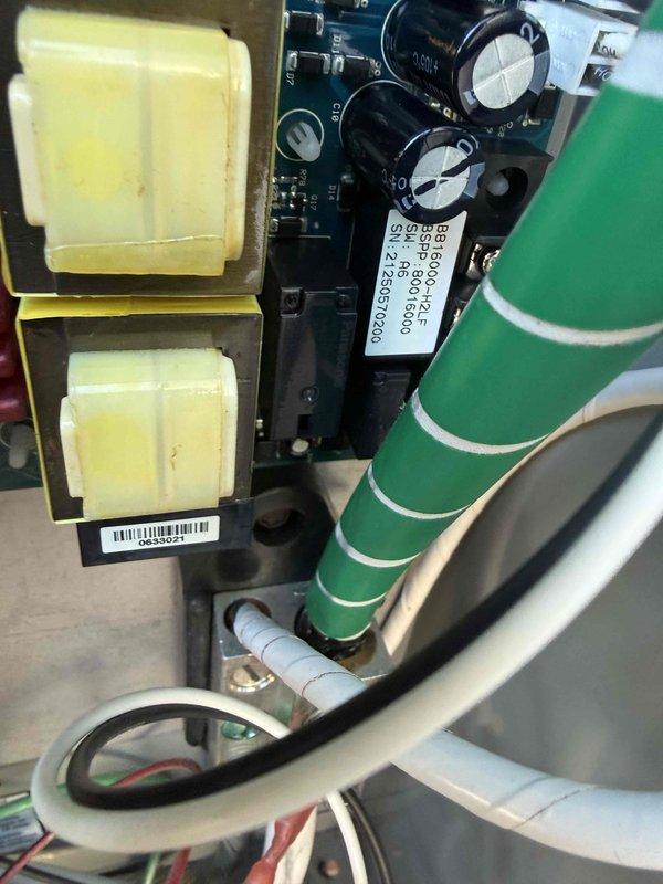 Responded to service call for Briggs and Stratton 12kW standby generator displaying speed sensor error code. Accessed internal control panel and inspected electronic control board assembly, capacitors, and sensor connections. Documented circuit board condition including terminal blocks, capacitor bank, and control module (model B816000-F-ALP) for warranty verification purposes.