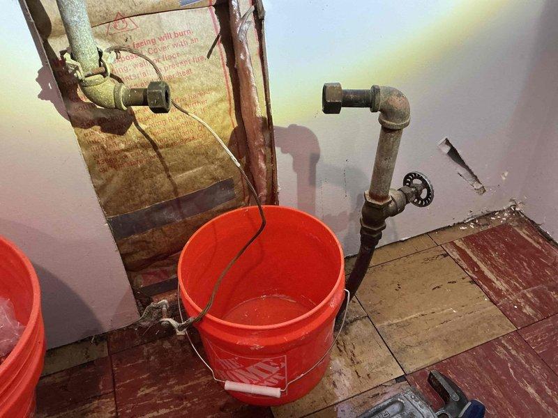 Responded to emergency water leak in main line located in basement of 1952-built home. Upon arrival, shut off water supply from exterior shutoff valve to prevent further water damage. Identified active leak in corroded main water line piping system, which had been leaking for approximately two days prior to service call.

Removed deteriorated section of main line piping and installed new brass valve assembly with copper pipe connections. Utilized compression fittings with corrosion-resistant seals at joint connections to ensure watertight installation. Secured new piping to existing wall structure and verified proper alignment with existing plumbing infrastructure.

Restored water supply and pressure-tested entire main line system to confirm leak elimination and verify integrity of new installation. Monitored connections for several minutes under full pressure to ensure no weeping or seepage at joints. Confirmed proper water flow throughout home and verified all fixtures operational. L