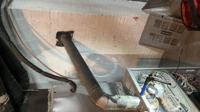 Responded to no heat call on 9-year-old furnace located in basement. Upon inspection, found inducer motor heavily caked with dust and debris, restricting airflow and preventing proper operation. Cleaned inducer motor assembly, verified pressure switch operation, and tested system through complete heating cycle. Unit restored to proper operation with adequate airflow and heat output.