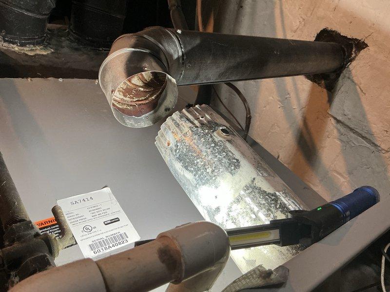 Responded to no heat call on 9-year-old furnace located in basement. Upon inspection, found inducer motor heavily caked with dust and debris, restricting airflow and preventing proper operation. Cleaned inducer motor assembly, verified pressure switch operation, and tested system through complete heating cycle. Unit restored to proper operation with adequate airflow and heat output.